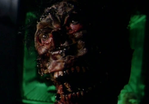 Stillbild 10 ur ZOMBIE FLESH EATERS 2